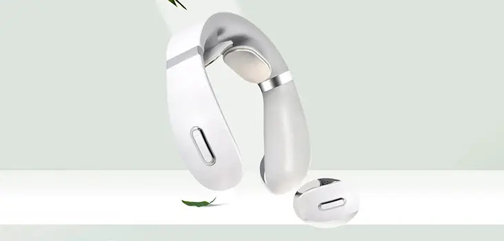 Close up of TheraHome Neck Massager in green background